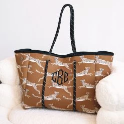 Monogrammed Neoprene Tote 13 Monogrammed Neoprene Tote -Fashion Clothing Store 0Xa Monogrammed neoprene tote in Hickory Leaping Leopard on sherpa chair