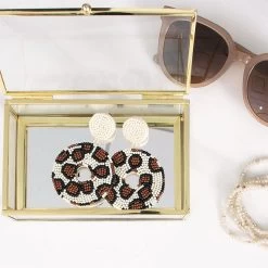 Leopard Earrings 6 Leopard Earrings -Fashion Clothing Store 0ov leopard earrings in jewelry box with sunglasses