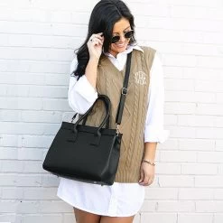Monogrammed Sweater Vest -Fashion Clothing Store 1ks brunette wearing camel sweater vest with shirt dress