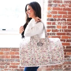 Monogrammed Quilted Weekender -Fashion Clothing Store 4fb fall botanical quilted weekender on shoulder2