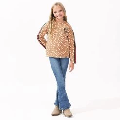 Monogrammed Kids Striped Sleeve Shirt 9 Monogrammed Kids Striped Sleeve Shirt -Fashion Clothing Store 4gO youth girl wearing striped sleeve shirt with jeans