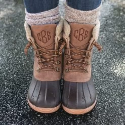 Monogrammed Explorer Duck Boots 12 Monogrammed Explorer Duck Boots -Fashion Clothing Store 6L1 explorer duck boots on wet pavement