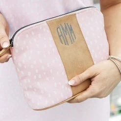 Monogrammed Dottie Cosmetic Case -Fashion Clothing Store 9RU close up of pink dottie cosmetic case and dress
