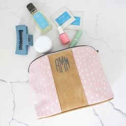 Monogrammed Dottie Cosmetic Case -Fashion Clothing Store 9RU spill shot of pink dottie cosmetic case
