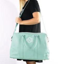 Monogrammed Duffel Weekender 10 Monogrammed Duffel Weekender -Fashion Clothing Store 9Vo girl wearing mint duffel weeknder on shoulder