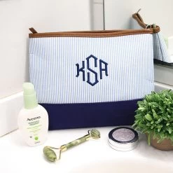 Monogrammed Seersucker Cosmetic Bag -Fashion Clothing Store AFC seersucker cosmetic bag on countertop