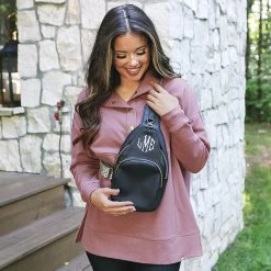 Monogrammed Sling Purse -Fashion Clothing Store B8a black sling purse worn over shoulder