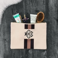 Monogrammed Canvas Pouch -Fashion Clothing Store BAx black brown stripe canvas pouch with makeup spilled out