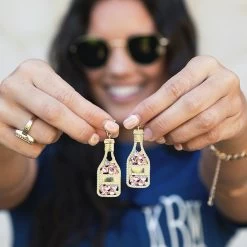 Rosé All Day Earrings 7 Rosé All Day Earrings -Fashion Clothing Store BHk girl holding rose all day earrings