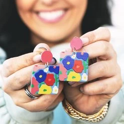 Flower Earrings -Fashion Clothing Store Bqi coral flower earrings in hands