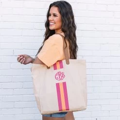 Monogrammed Canvas Bag -Fashion Clothing Store CAy Monogrammed Canvas Bag Orange and Pink on shoulder