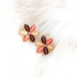 Flower Stud Earrings -Fashion Clothing Store Cxe brown flower studs on white carpet