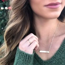 Monogrammed Bar Necklace 6 Monogrammed Bar Necklace -Fashion Clothing Store DCB monogrammed bar necklace in gold with sweater