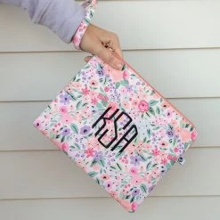 Monogrammed Wristlet Pouch -Fashion Clothing Store DVF holding wristlet pouch coral floral