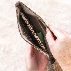 Monogrammed Wristlet -Fashion Clothing Store Dq9 holding Monogrammed Wristlet in gray inside new