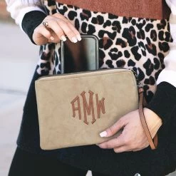 Monogrammed Wristlet -Fashion Clothing Store Dq9 holding Monogrammed Wristlet in taupe new
