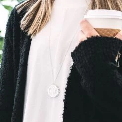 Monogrammed Locket 9 Monogrammed Locket -Fashion Clothing Store FqA silver monogrammed locket with white tee