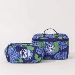Monogrammed Quilted Cosmetic Case -Fashion Clothing Store HW3 studio shot of blue hydrangea quilted train and cosmetic cases 02