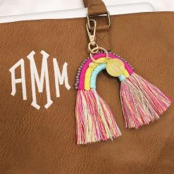 Monogrammed Rainbow Keychain -Fashion Clothing Store HpO rainbow keychain on brown laptop bag 02