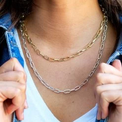 Chain Necklace 6 Chain Necklace -Fashion Clothing Store HtK gold and silver chain necklaces on neck with denim jacket close up