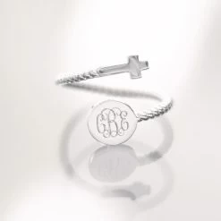 Monogrammed Adjustable Cross Ring -Fashion Clothing Store I0v adjustable cross ring on table
