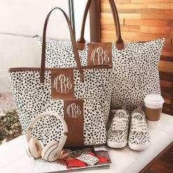 Monogrammed Spotted Weekender -Fashion Clothing Store J9J monogrammed spotted travel set on bench