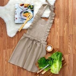 Monogrammed Apron -Fashion Clothing Store Jmf name on brown linen apron flatlay