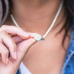 Monogrammed Signet Ring Necklace -Fashion Clothing Store K3k girl wearing silver signet ring necklaces