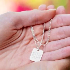 Monogrammed Layered Pendant Necklace -Fashion Clothing Store KwH silver layered pendant necklace in hands