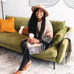 Monogrammed Plaid Poncho -Fashion Clothing Store LC6 black tan ivory plaid poncho with green couch