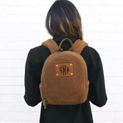 Monogrammed Mini Sherpa Backpack -Fashion Clothing Store LFa brunette wearing mini sherpa backpack 02