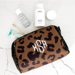 Monogrammed Neoprene Cosmetic Case 16 Monogrammed Neoprene Cosmetic Case -Fashion Clothing Store LSA hickory leopard neopren cosmetic case spill out in bathroom