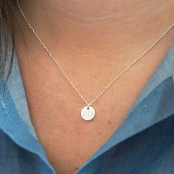 Monogrammed Tiny Disc Necklace -Fashion Clothing Store MMt tiny disc necklace in silver on neck