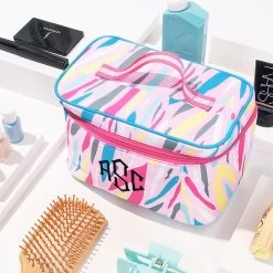 Monogrammed Train Case -Fashion Clothing Store MPk personalized train case in pink safari with cosmetic accessories