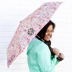 Monogrammed Umbrella -Fashion Clothing Store MtJ coral floral umbrella open with rain jacket