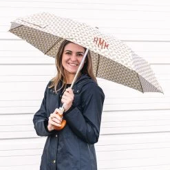 Monogrammed Umbrella -Fashion Clothing Store MxM tan checkers umbrella open