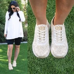 Monogrammed Leopard Sneakers 17 Monogrammed Leopard Sneakers -Fashion Clothing Store N0M Neutral tan Leopard in grass with biker shorts