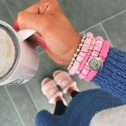 Monogrammed Mix Bead Bracelet Stack -Fashion Clothing Store Npv monogrammed pink mix bread bracelets on wrist with coffee in hand