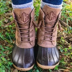 Monogrammed Duck Boots -Fashion Clothing Store NwZ brown duck boots in grass