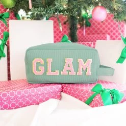 Monogrammed Corded Cosmetic Case -Fashion Clothing Store PeN chenille letters in pink and gold on monogrammed corded cosmetic case in aqua