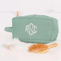 Monogrammed Corded Cosmetic Case -Fashion Clothing Store PeN monogrammed aqua corded cosmetic case with toothbrush