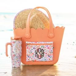 Monogrammed Waterproof Beach Bag -Fashion Clothing Store SxH coral floral waterproof monogrammed beach bag in sand