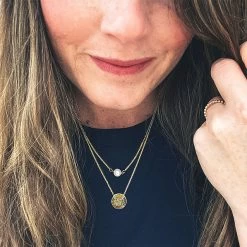 Monogrammed Layered Pearl Necklace -Fashion Clothing Store TqB gold pearl monogrammed necklace with black top