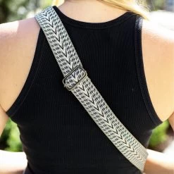 Monogrammed Sling Purse -Fashion Clothing Store UEn close up of taupe sling purse accent strap