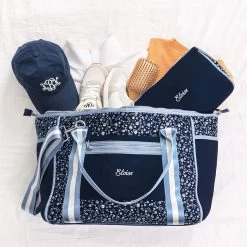 Monogrammed Neoprene Weekender -Fashion Clothing Store UpY name on spill shot of navy ditsy floral weekender and cosmetic case copy