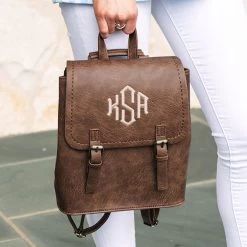 Monogrammed Backpack Purse 9 Monogrammed Backpack Purse -Fashion Clothing Store UrU UPDATED holding brown backpack purse