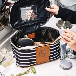 Monogrammed Striped Train Case -Fashion Clothing Store X5Z train case opened on bathroom counter