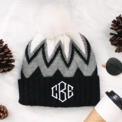 Monogrammed Pom Pom Beanie 19 Monogrammed Pom Pom Beanie -Fashion Clothing Store XYU black and white pom pom beanie on white fur rug