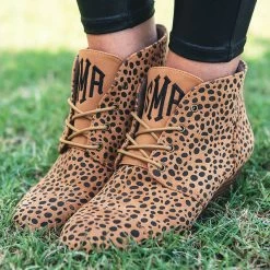 Monogrammed Booties -Fashion Clothing Store cPQ monogrammed leopard dot booties side angle in grass