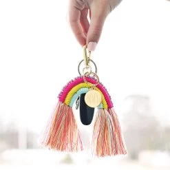 Monogrammed Rainbow Keychain -Fashion Clothing Store cTH girl holding rainbow keychain